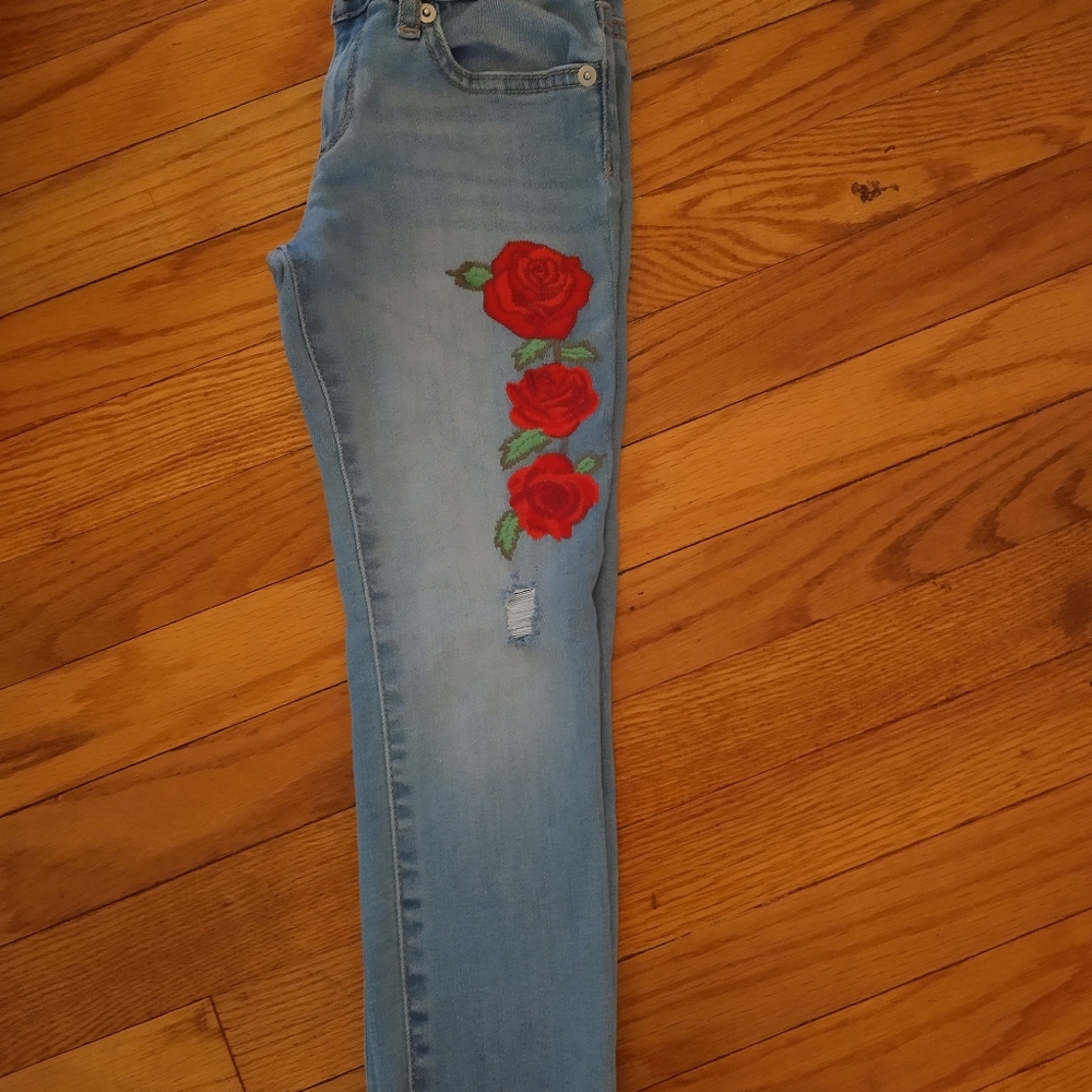 Distressed blue jeans